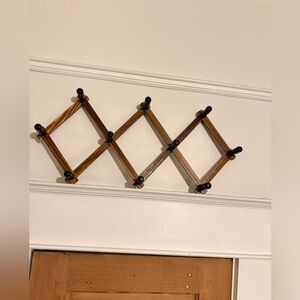Vintage Expandable Wooden Wall Rack with Black Accents